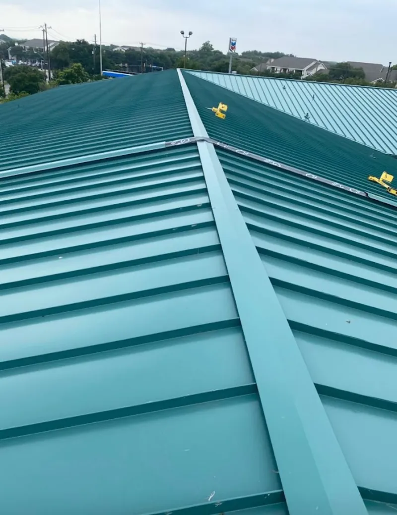 Green commercial metal roof ridge and valley for Metal Roof Repair in Parlier